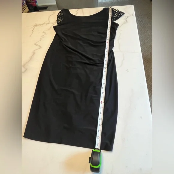 Elegant Black Dress with Embellished Sleeves - Picture 9 of 10